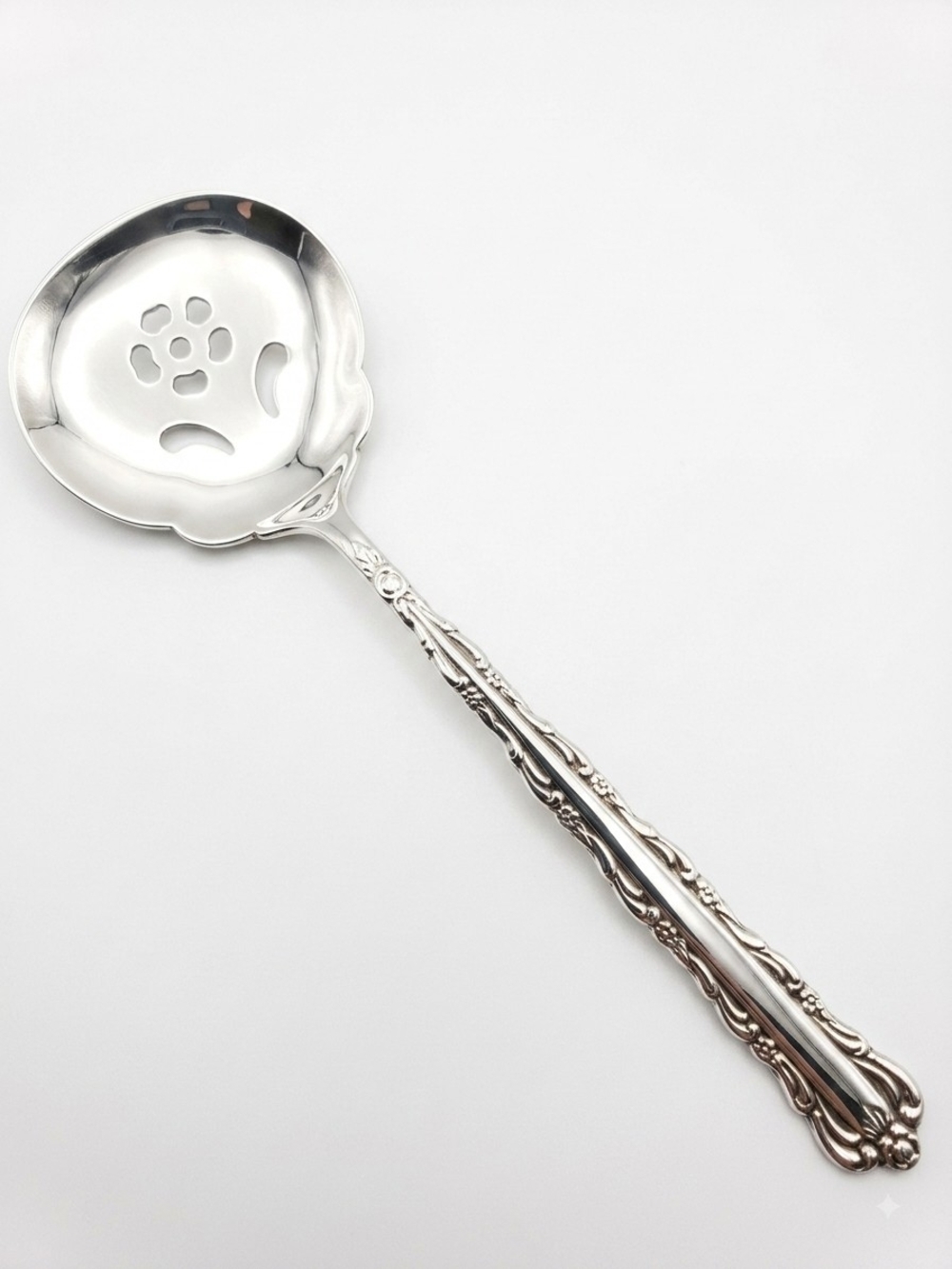 Decorative Silver Slotted Serving Spoon - Elegant Floral Pattern